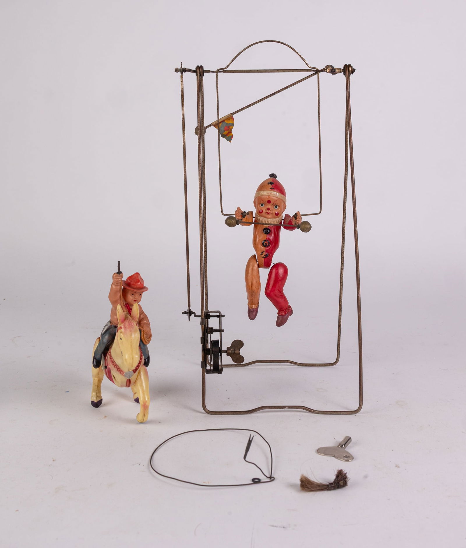 Vintage Wind-Up Toys: Vintage Wind-Up Toys Size 7" x 12" x 12" Literature Brooks Auction is not responsible for outbids. Questions? Call the office at (856) 694-2960 or email us directly at info@brooks.auction. &#