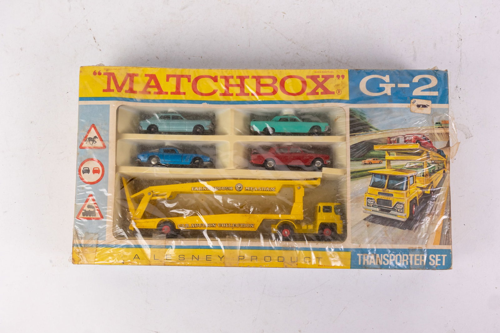 Matchbox G-2 Transporter Set Made In England 60s NIB: Matchbox G-2 Transporter Set Made In England 60s NIB Literature Brooks Auction is not responsible for outbids. Questions? Call the office at (856) 694-2960 or email us directly at info@brooks.auction