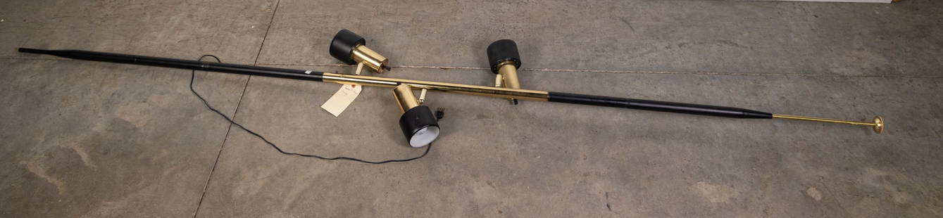 Mid Century Modern MCM Black and Gold Toned Tension Pole Lamp: Mid Century Modern MCM Black and Gold Toned Tension Pole Lamp Size 106" x 14" x 8" Literature  Brooks Auction is not responsible for outbids. Questions? Call the office at (856) 694-2960 or email us