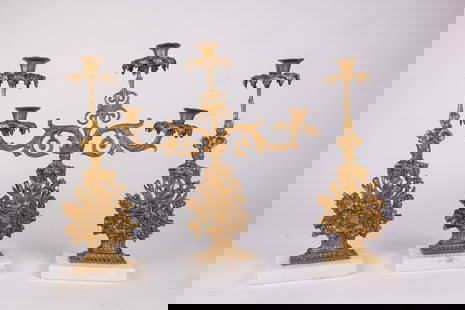 Set of Three Gold Toned Ornate Marble Base Candelabras: Set of Three Gold Toned Ornate Marble Base Candelabras Size 17" x 16" x 5" Literature Brooks Auction is not responsible for outbids. Questions? Call the office at (856) 694-2960 or email us directly