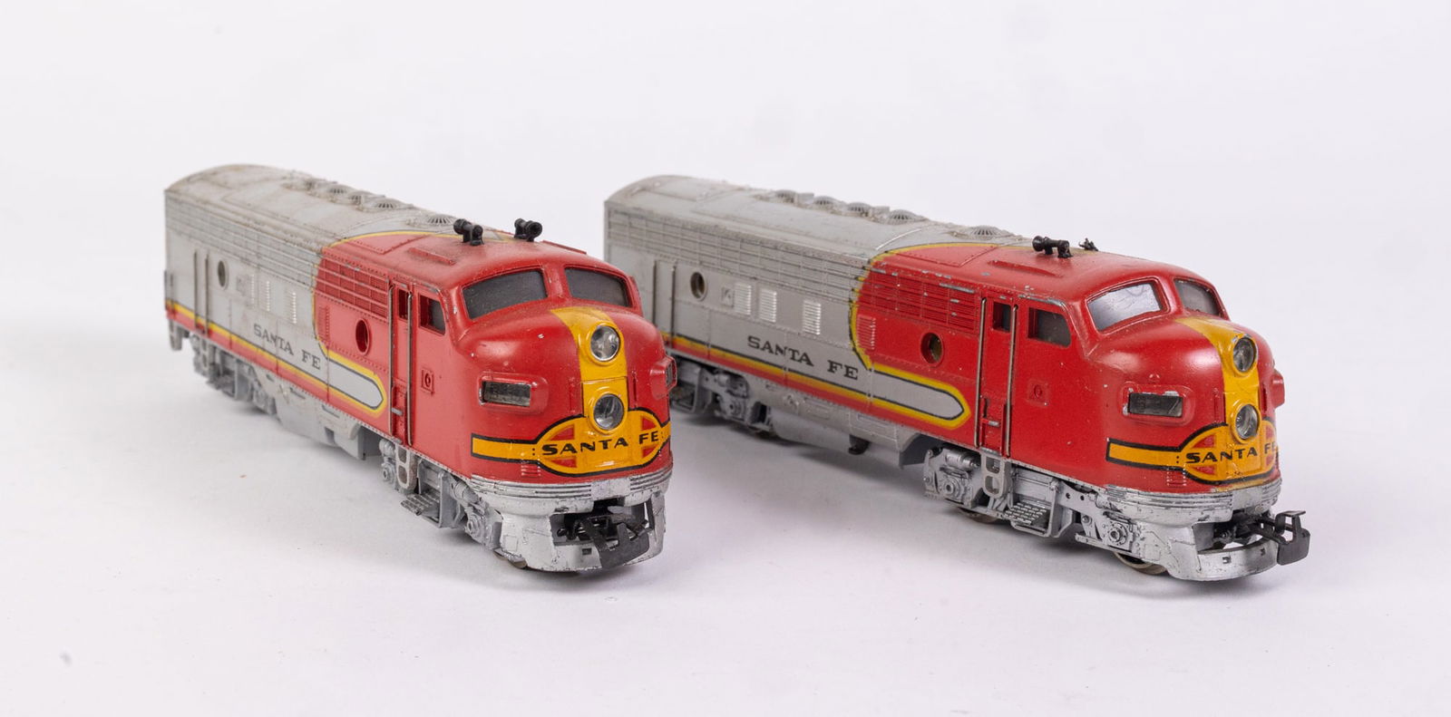 Duo of Marklin HO Santa Fe Diesel Locomotive Engines: Duo of Marklin HO Santa Fe Diesel Locomotive Engines Size 2" x 7" x 2" Literature Brooks Auction is not responsible for outbids. Questions? Call the office at (856) 694-2960 or email us directly at