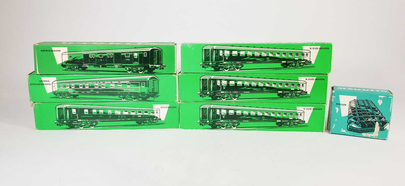 Assorted Vintage Marklin Train Cars in Box: Assorted Vintage Marklin Train Cars in Box Size 2" x 10" x 2" Literature Brooks Auction is not responsible for outbids. Questions? Call the office at (856) 694-2960 or email us directly at info@broo