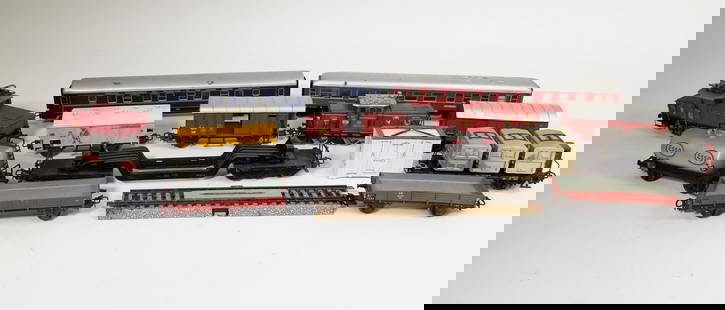 Large Assortment of Märklin Train Cars & Accessories: Large Assortment of M&#228;rklin Train Cars & Accessories Size 4" x 6" x 3" Literature  Brooks Auction is not responsible for outbids. Questions? Call the office at (856) 694-2960 or email us directl