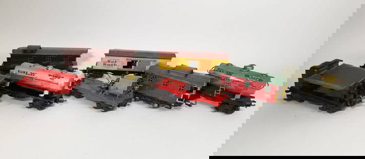 Assorted Vintage Tin Lionel Model Railroad Train Cars: Assorted Vintage Tin Lionel Model Railroad Train Cars Size 3" x 8" x 2" Literature  Brooks Auction is not responsible for outbids. Questions? Call the office at (856) 694-2960 or email us directly at