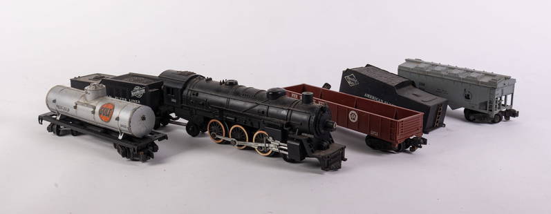 American Flyer Locomotive & Tender/Freight Cars: American Flyer Locomotive & Tender/Freight Cars Size 12" x 4" x 3" Literature  Brooks Auction is not responsible for outbids. Questions? Call the office at (856) 694-2960 or email us directly at info