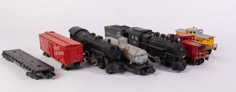American Flyer Locomotive & Tender/Freight Cars: American Flyer Locomotive & Tender/Freight Cars Size 12" x 4" x 3" Literature  Brooks Auction is not responsible for outbids. Questions? Call the office at (856) 694-2960 or email us directly at info