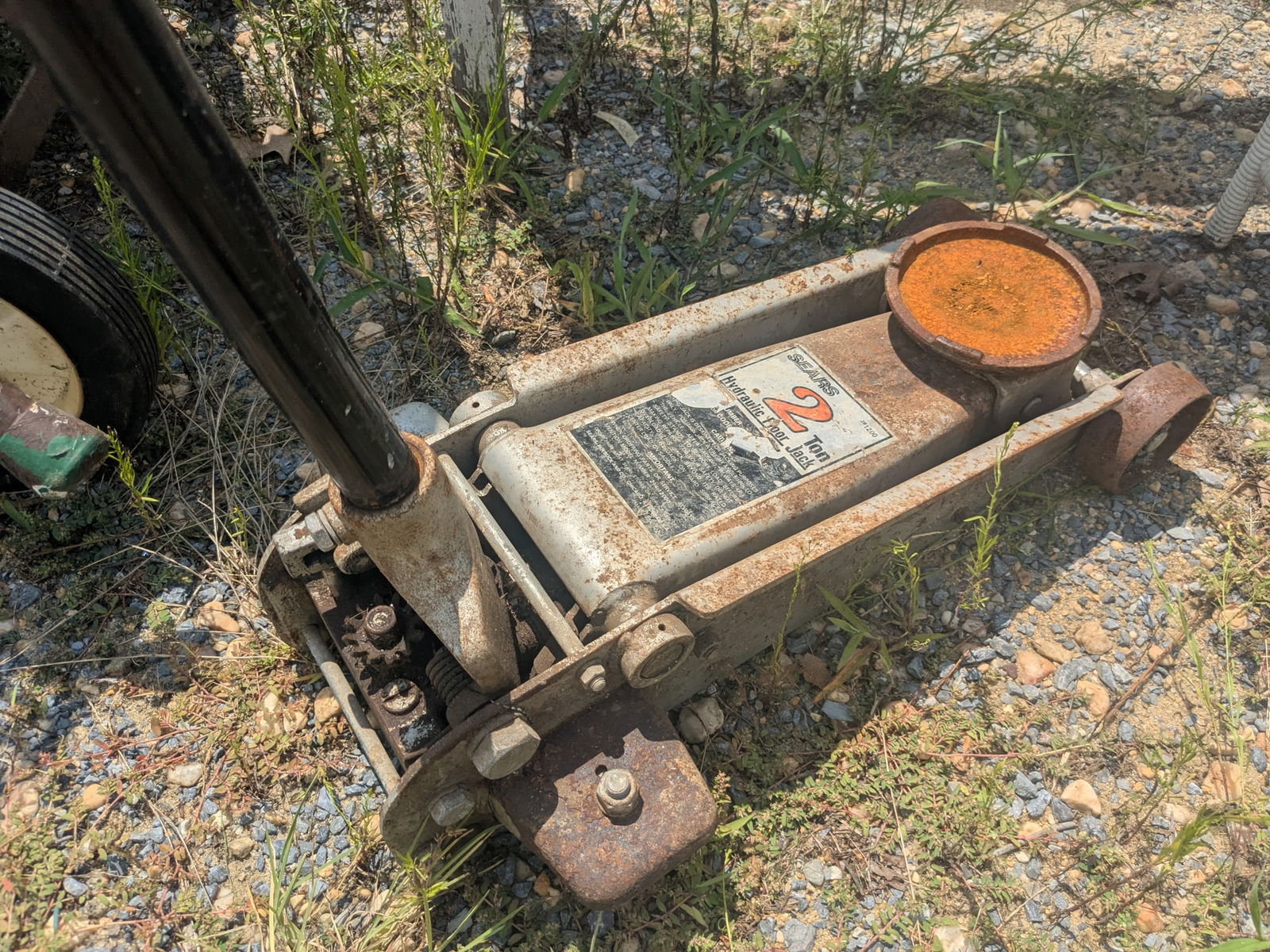Sears 2-Ton Hydraulic Floor Jack: Sears 2-Ton Hydraulic Floor Jack Literature Questions? Call the office at (856) 694-2960 or email us directly at info@brooks.auction. • Please read descriptions carefully before bidding, and con