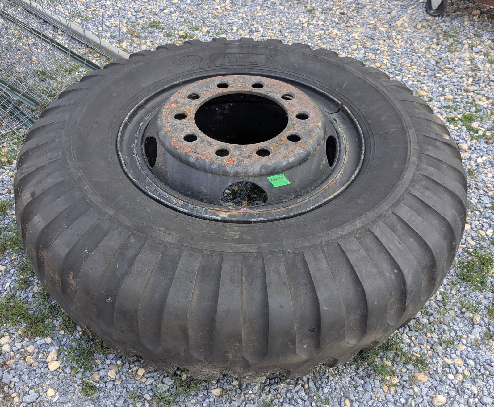 Large Goodyear Tire: Large Goodyear Tire Literature Questions? Call the office at (856) 694-2960 or email us directly at info@brooks.auction. • Please read descriptions carefully before bidding, and contact us if yo