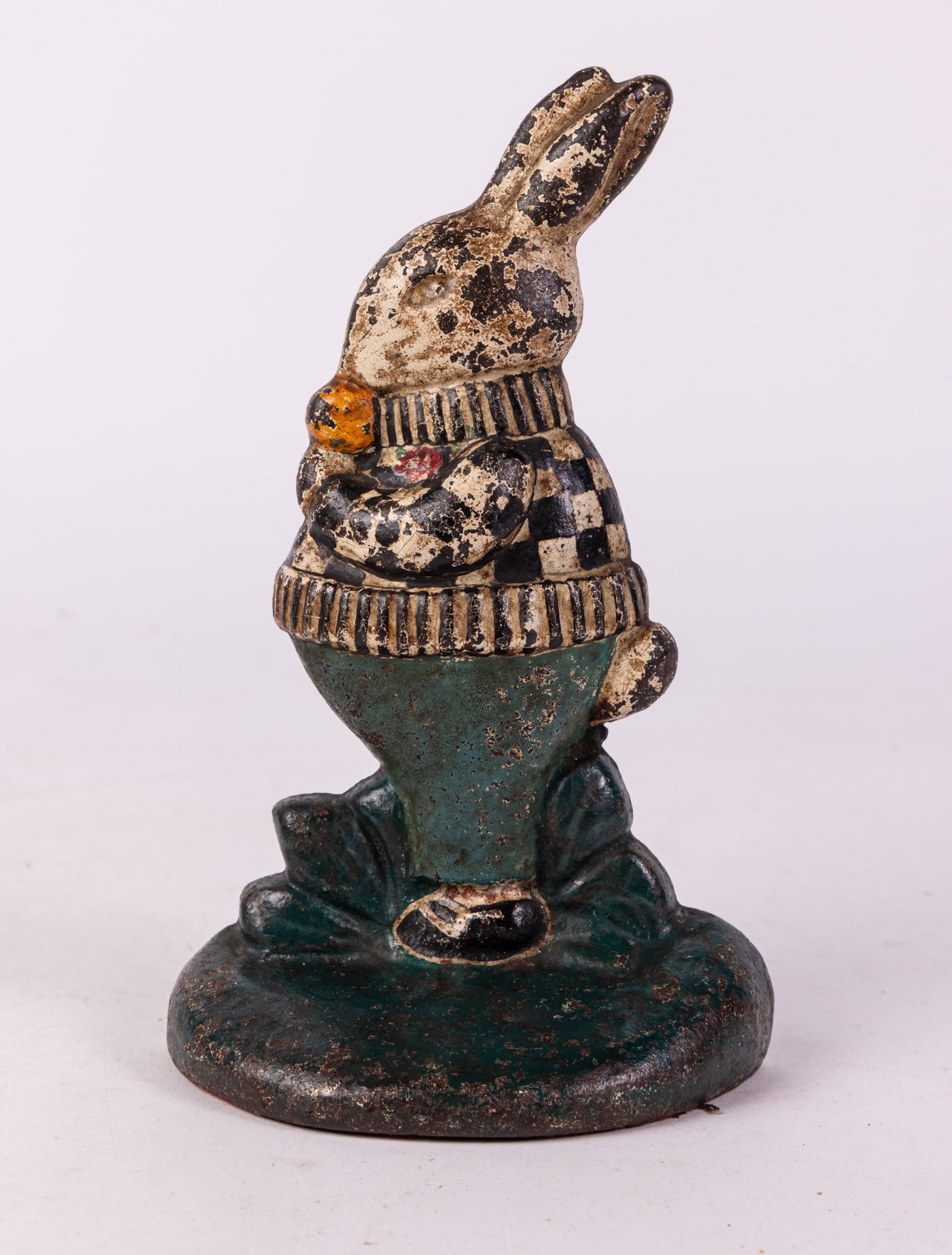 Rabbit Eating Cabbage Cast Iron Doorstop: Rabbit Eating Cabbage Cast Iron Doorstop Size 8" x 5" x 3" Literature Brooks Auction is not responsible for outbids. Questions? Call the office at (856) 694-2960 or email us directly at info@brooks.