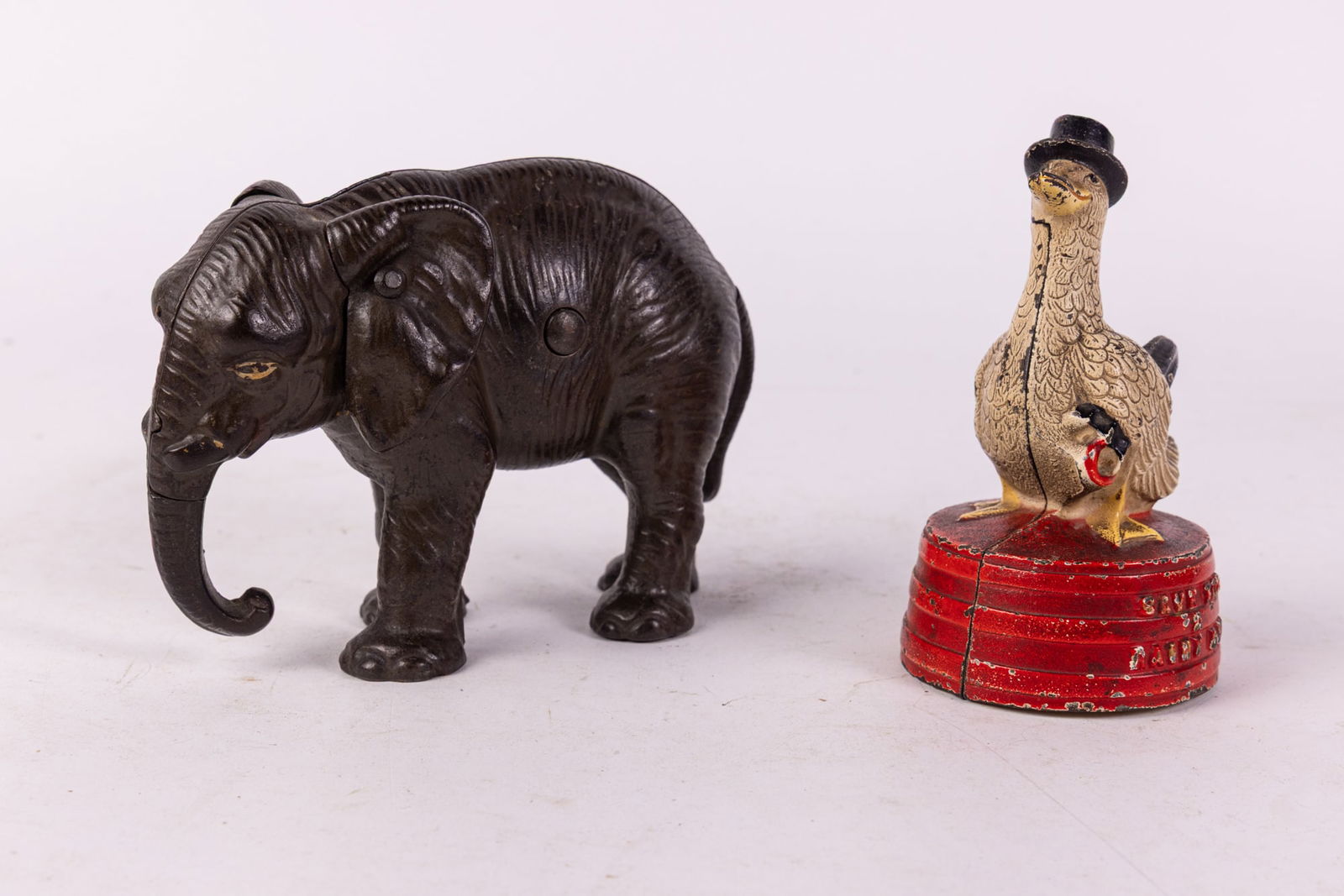 Two Cast Iron Still Banks (1 of 4)