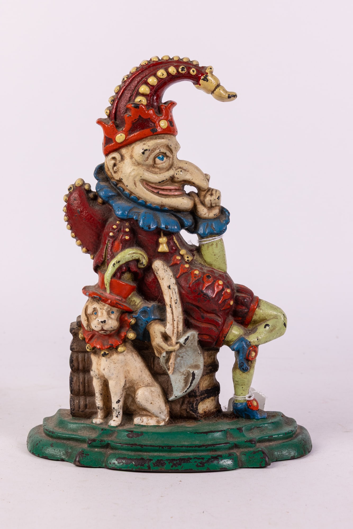 Cast Iron Punch Door Stop: Cast Iron Punch Door Stop Size 12" x 9" x 4" Literature Brooks Auction is not responsible for outbids. Questions? Call the office at (856) 694-2960 or email us directly at info@brooks.auction.