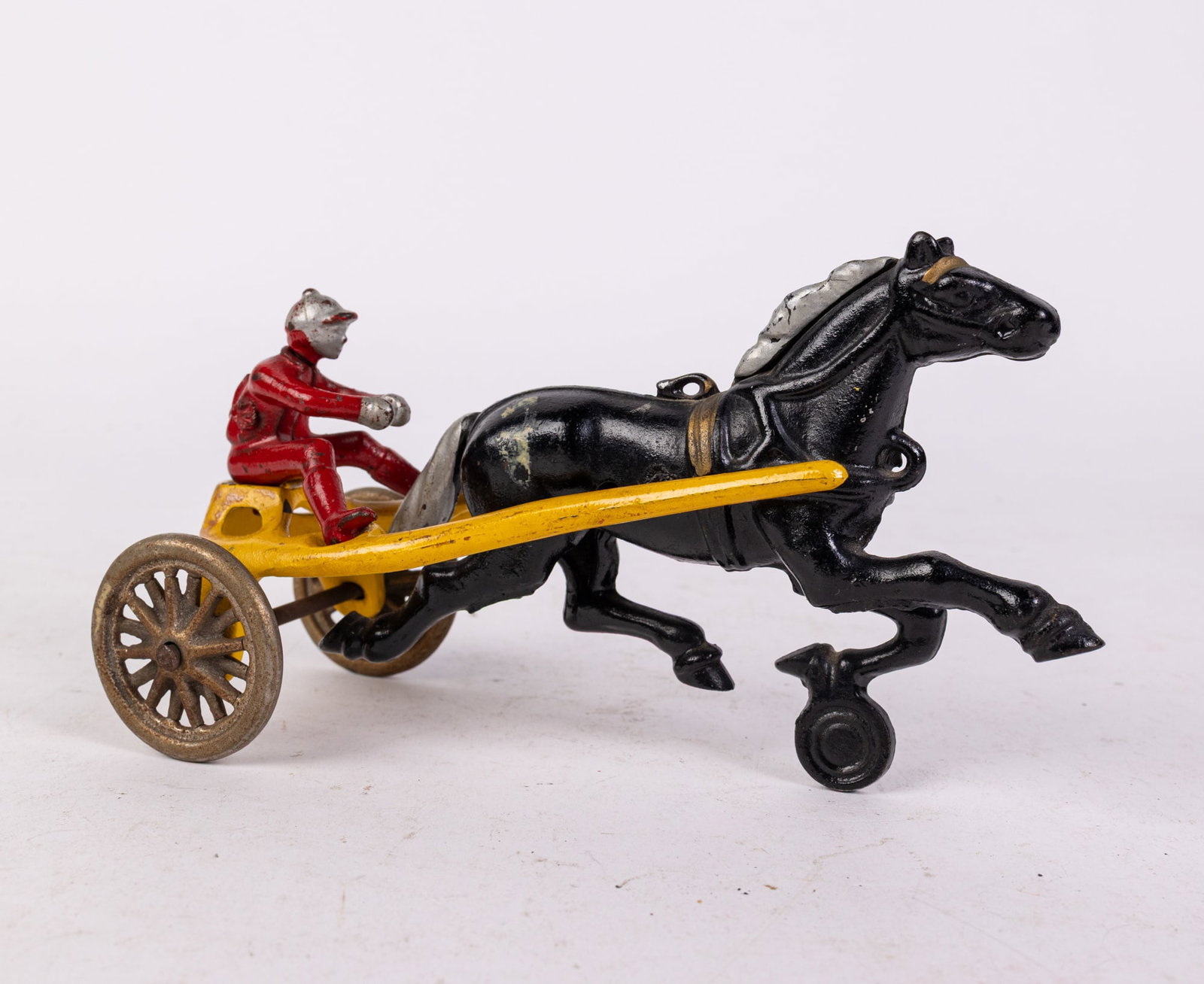 Kenton Cast Iron Toys No. 150 "Sulky" Horse with Carriage: Kenton Cast Iron Toys No. 150 "Sulky" Horse with Carriage Size 4" x 7" x 4" Literature Brooks Auction is not responsible for outbids. Questions? Call the office at (856) 694-2960 or email us directl