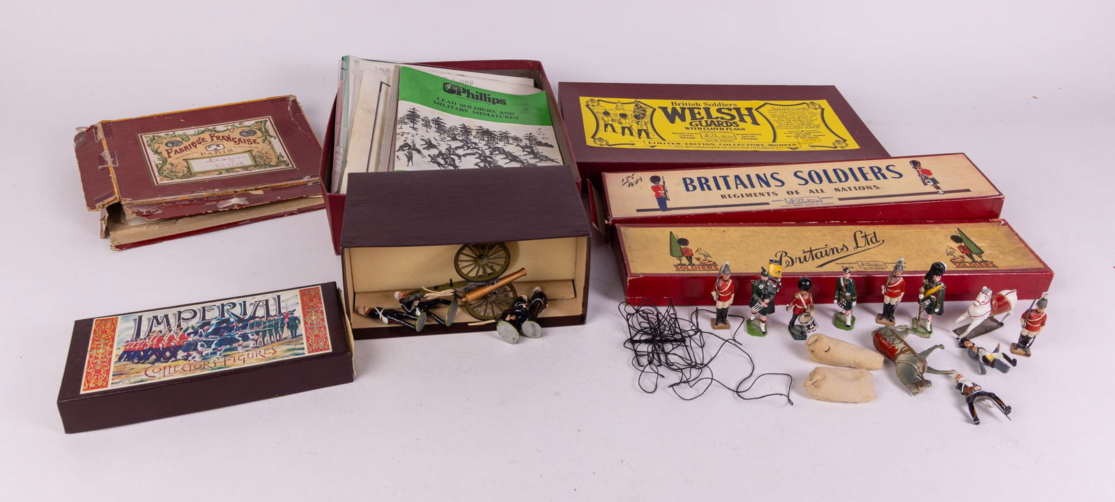Lead Figure & Ephemera Assortment ft CBG & Britains Ltd: Lead Figure & Ephemera Assortment ft CBG & Britains Ltd Size 12" x 12" x 6" Literature Brooks Auction is not responsible for outbids. Questions? Call the office at (856) 694-2960 or email us directl