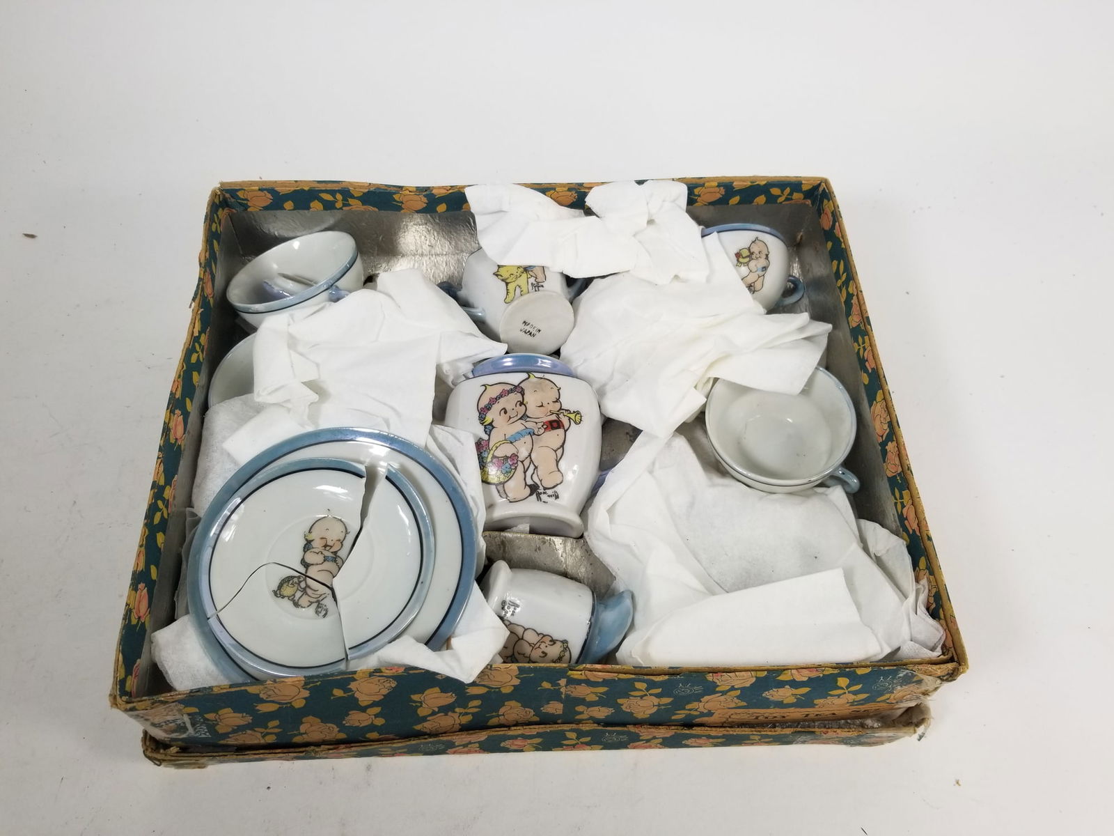 Vintage Japanese Kewpie Child's Tea Set: Vintage Japanese Kewpie Child's Tea Set Size 12" x 10" x 3" Literature Brooks Auction is not responsible for outbids. Questions? Call the office at (856) 694-2960 or email us directly at info@brooks