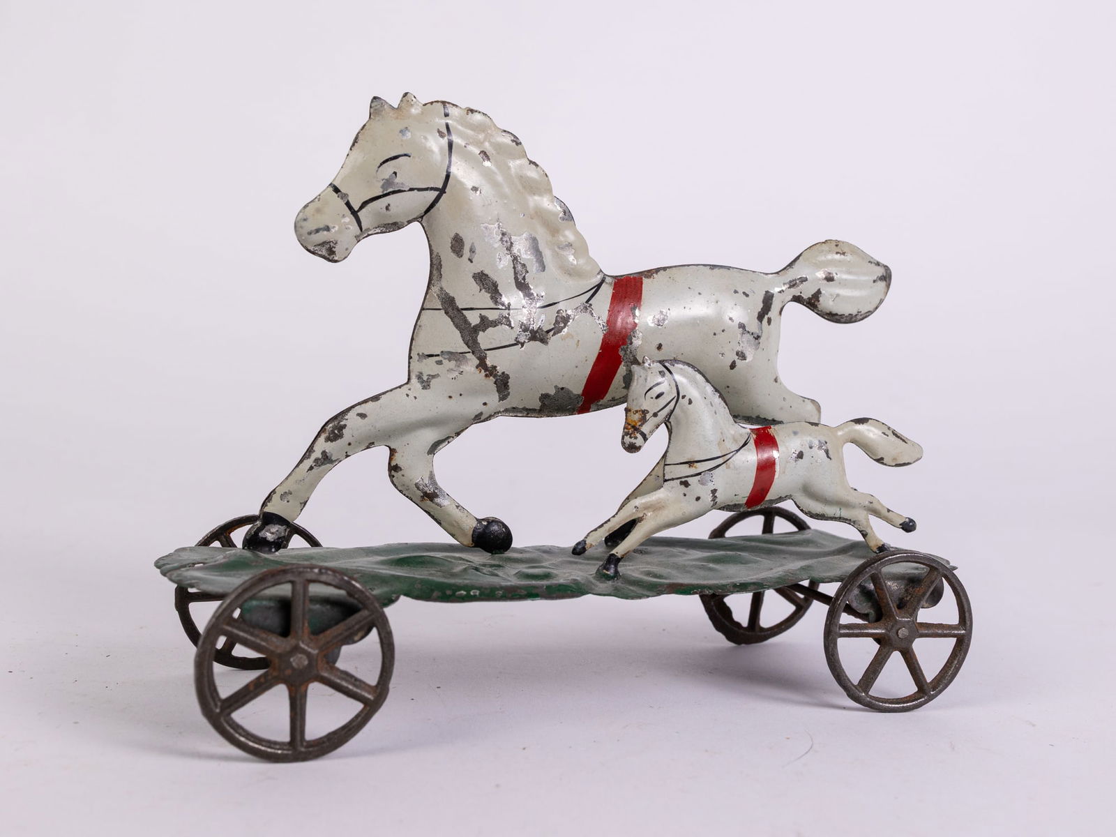 Althof Bergmann American Tin Horse & Pony on Platform Pull Toy: Althof Bergmann American Tin Horse & Pony on Platform Pull Toy Size 5" x 6" x 3" Literature Brooks Auction is not responsible for outbids. Questions? Call the office at (856) 694-2960 or email us di