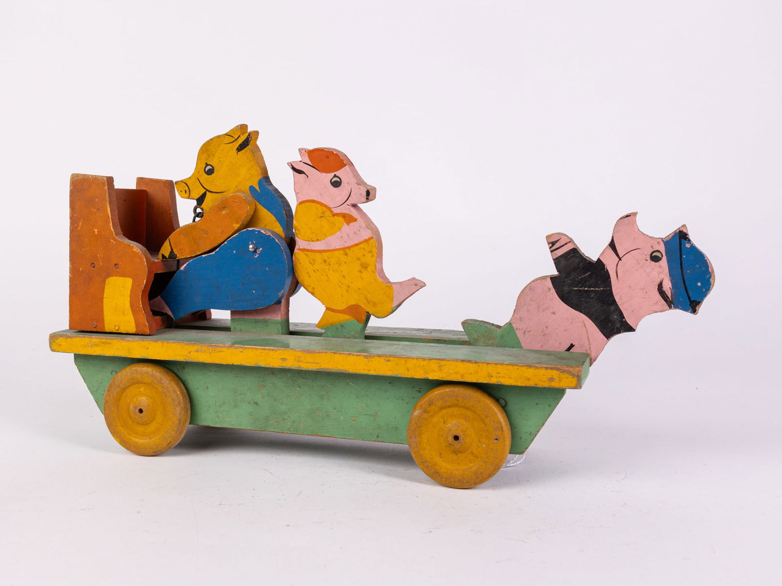 Antique Early Toy Kraft Co. 3 Little Pigs w/ Piano Articulated Pull Toy: Antique Early Toy Kraft Co. 3 Little Pigs w/ Piano Articulated Pull Toy Size 8" x 12" x 4" Literature Brooks Auction is not responsible for outbids. Questions? Call the office at (856) 694-2960 or e