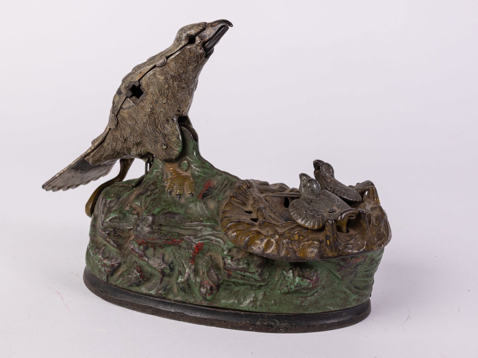 Nesting Bird Mechanical Cast Iron Bank: Nesting Bird Mechanical Cast Iron Bank Size 6" x 9" x 4" Literature Brooks Auction is not responsible for outbids. Questions? Call the office at (856) 694-2960 or email us directly at info@brooks.au