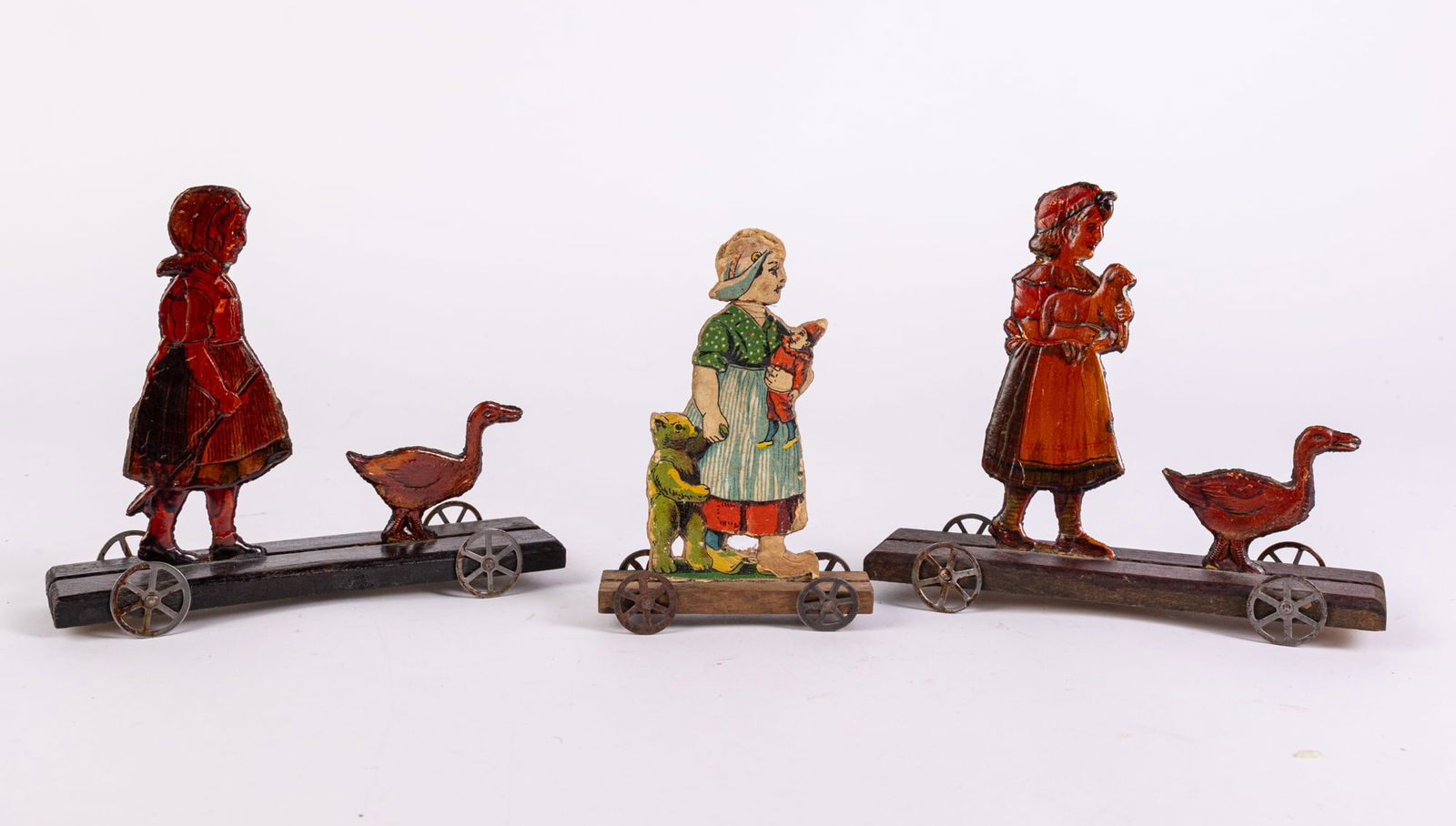 Antique Early Diecut Girls & Animals on Platform Pull Toys: Antique Early Diecut Girls & Animals on Platform Pull Toys Size 6" x 7" x 2" Literature Brooks Auction is not responsible for outbids. Questions? Call the office at (856) 694-2960 or email us direct