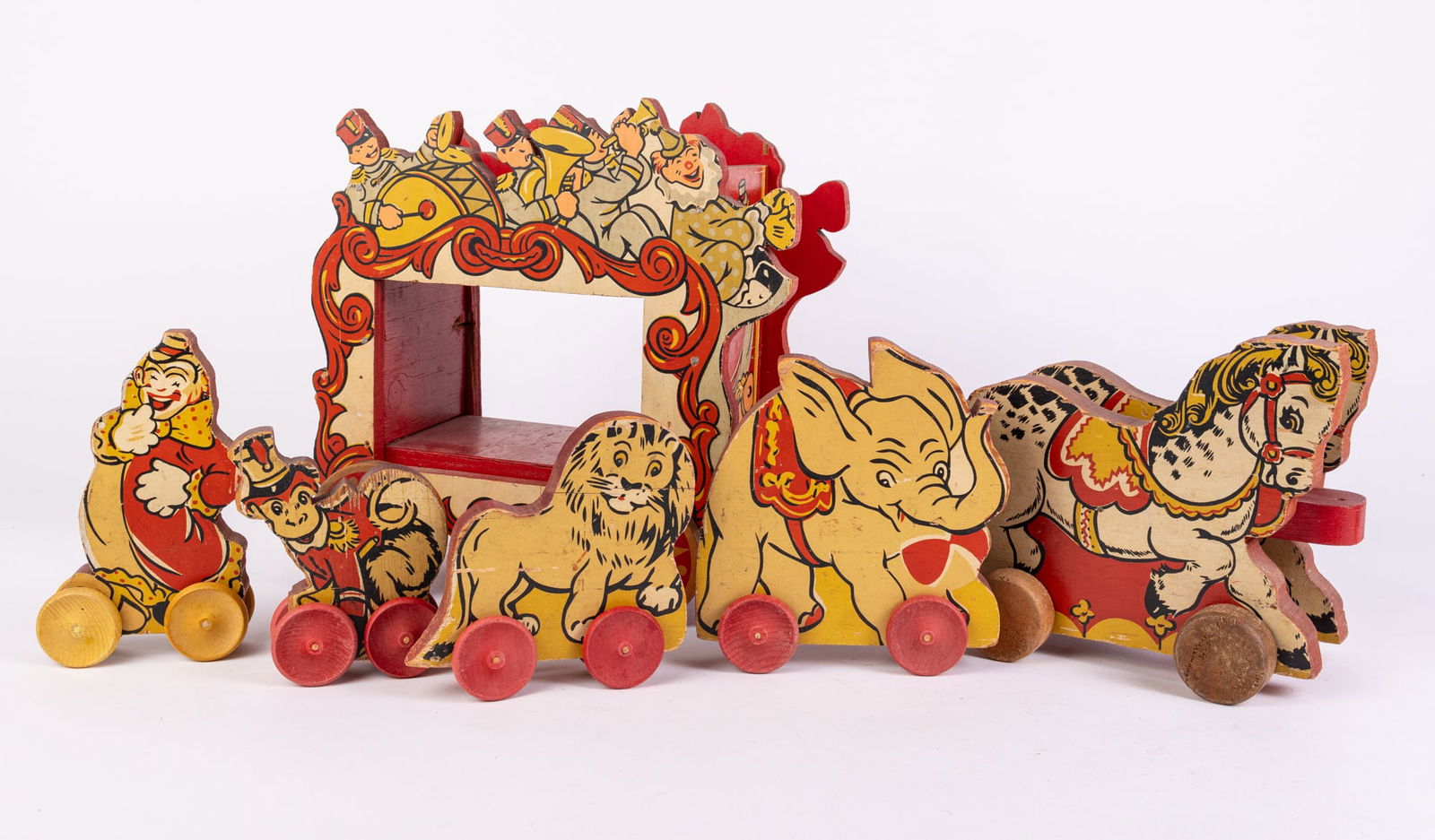 Antique Early Wood Circus Pull Toy w/ Figures on Wheels: Antique Early Wood Circus Pull Toy w/ Figures on Wheels Size 11" x 10" x 6" Literature Brooks Auction is not responsible for outbids. Questions? Call the office at (856) 694-2960 or email us directl