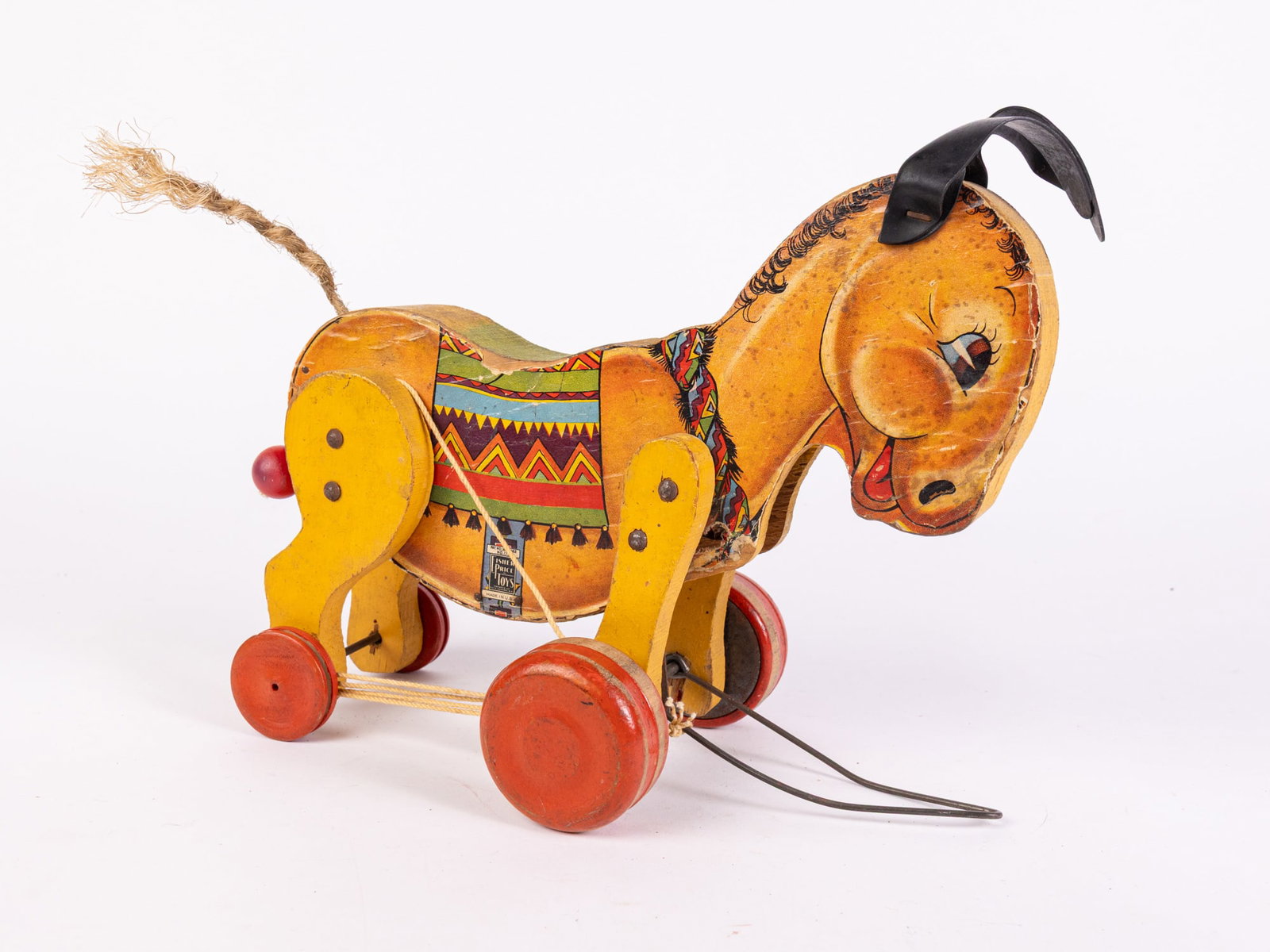 Fisher Price Paper on Wood No. 175 "Kicking Donkey": Fisher Price Paper on Wood No. 175 "Kicking Donkey" Size 10" x 10" x 6" Literature Brooks Auction is not responsible for outbids. Questions? Call the office at (856) 694-2960 or email us directly at