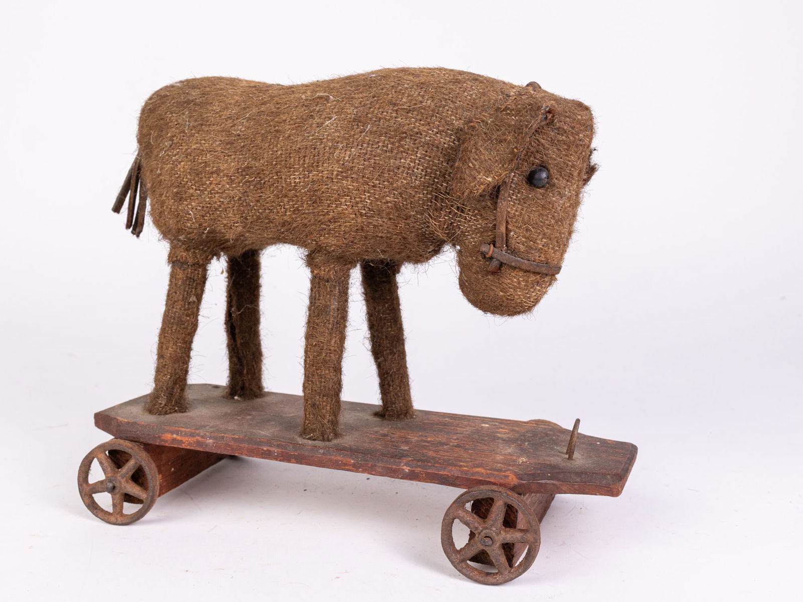 Early Burlap Straw Stuffed Donkey Pull Toy: Early Burlap Straw Stuffed Donkey Pull Toy Size 8" x 10" x 5" Literature Brooks Auction is not responsible for outbids. Questions? Call the office at (856) 694-2960 or email us directly at info@broo