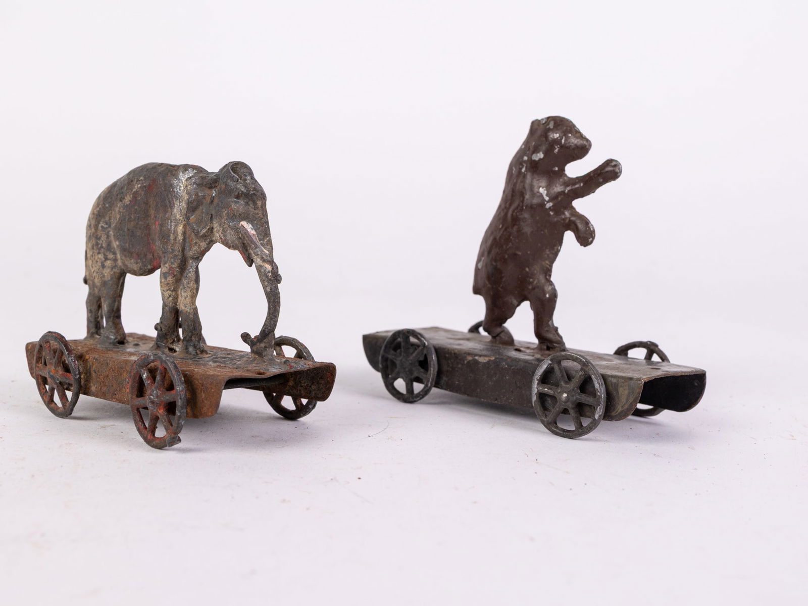 Antique Early Cast Metal Bear & Elephant on Platform Pull Toys (1 of 4)