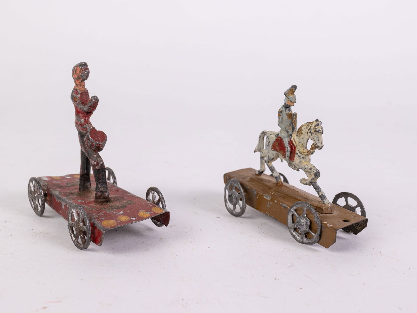 Antique Early Cast Metal Drummer & Knight Riding Horse on Platform Pull Toys: Antique Early Cast Metal Drummer & Knight Riding Horse on Platform Pull Toys Size 3" x 2" x 2" Literature Brooks Auction is not responsible for outbids. Questions? Call the office at (856) 694-2960