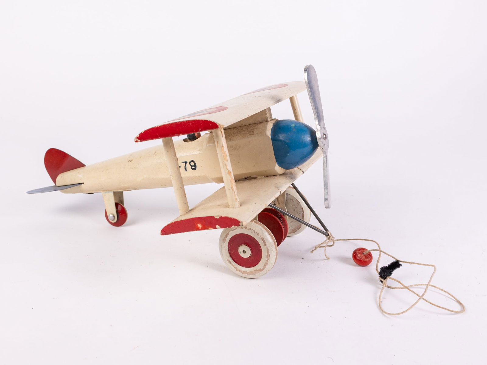 c.1920's Antique Gibbs Wood Bi-Plane Airplane Pull Toy: c.1920's Antique Gibbs Wood Bi-Plane Airplane Pull Toy Size 6" x 11" x 8" Literature Brooks Auction is not responsible for outbids. Questions? Call the office at (856) 694-2960 or email us directly