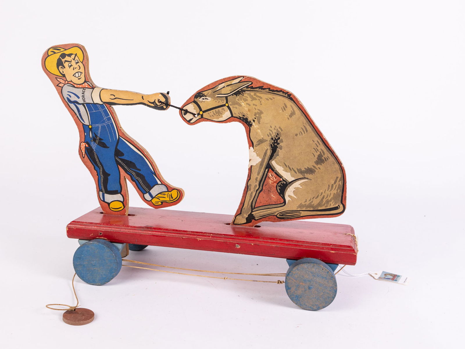 Vintage Holland "Horace & Mule" Paper on Wood Pull Toy: Vintage Holland "Horace & Mule" Paper on Wood Pull Toy Size 10" x 12" x 5" Literature Brooks Auction is not responsible for outbids. Questions? Call the office at (856) 694-2960 or email us directly