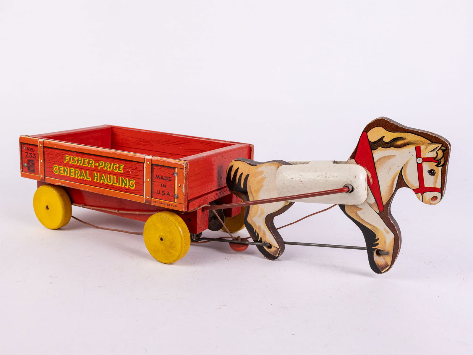 c.1941 Fisher Price #733 "General Hauling" Pony Express Pull Toy: c.1941 Fisher Price #733 "General Hauling" Pony Express Pull Toy Size 16" x 8" x 5" Literature Brooks Auction is not responsible for outbids. Questions? Call the office at (856) 694-2960 or email us