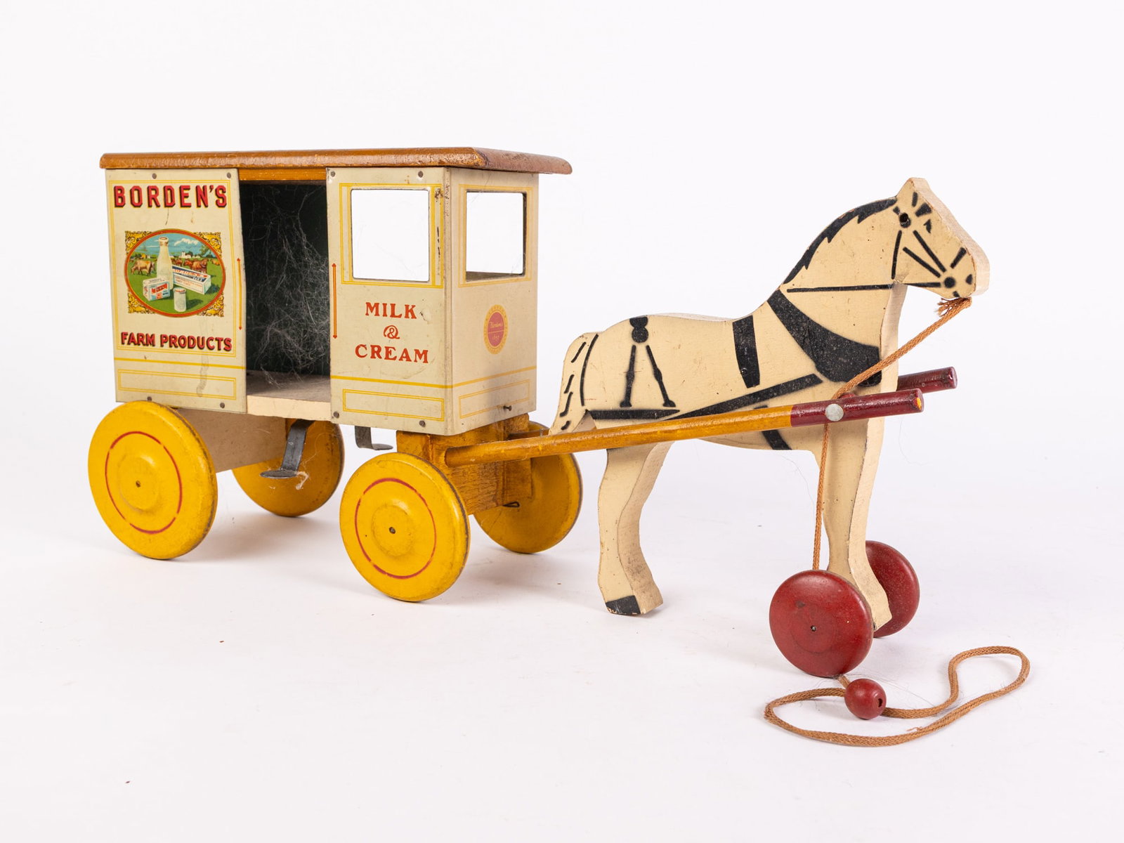1930's Rich's Toys Borden's Milk Wagon Pull Toy: 1930's Rich's Toys Borden's Milk Wagon Pull Toy, good color and condition. no repaint Size 9" x 18" x 5" Literature Brooks Auction is not responsible for outbids. Questions? Call the office at (856)
