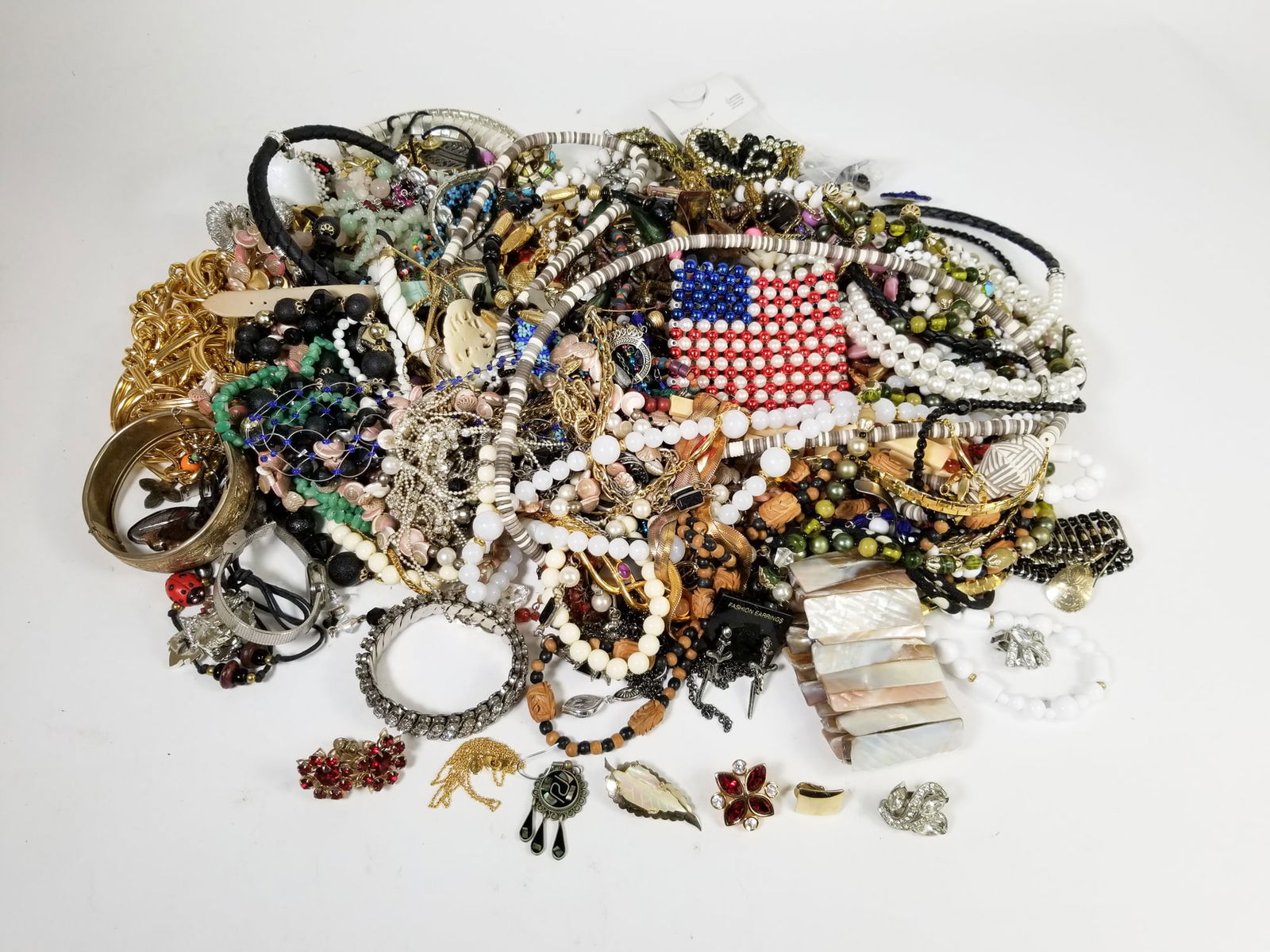 Vintage Costume Jewelry Assortment: Vintage Costume Jewelry Assortment, brands include: Sarah Cov, Avon, Coro, Monet, Trifari, Weiss, and more Literature Brooks Auction is not responsible for outbids. Questions? Call the office at (856