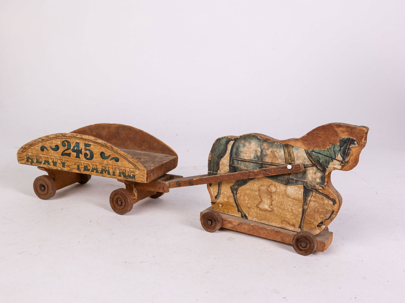 c. 1890s Bliss Mfg Co. "245" Heavy Teaming Dray Wagon - Paper Litho Pull Toy: c. 1890s Bliss Mfg Co. "245" Heavy Teaming Dray Wagon - Paper Litho Pull Toy Size 4" x 13" x 3" Literature Brooks Auction is not responsible for outbids. Questions? Call the office at (856) 694-2960