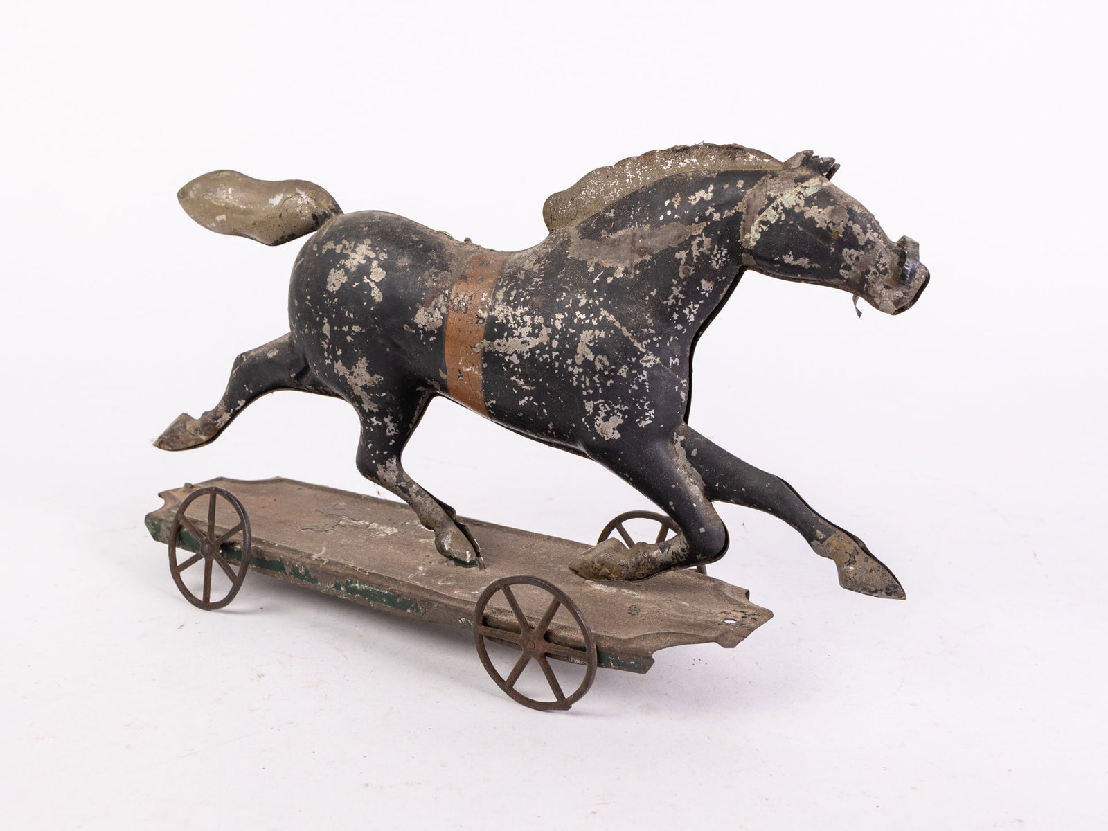 19th Century Tin Galloping Horse Pull Toy: 19th Century Tin Galloping Horse Pull Toy, missing one wheel Size 7" x 12" x 4" Literature Brooks Auction is not responsible for outbids. Questions? Call the office at (856) 694-2960 or email us dir