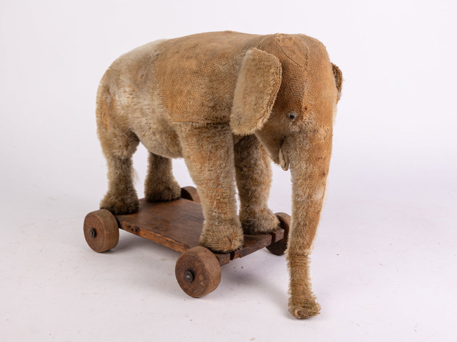 Antique Mohair Pull Along Elephant Stuffed Animal Toy: Antique Mohair Pull Along Elephant Stuffed Animal Toy Size 10" x 12" x 6" Literature Brooks Auction is not responsible for outbids. Questions? Call the office at (856) 694-2960 or email us directly