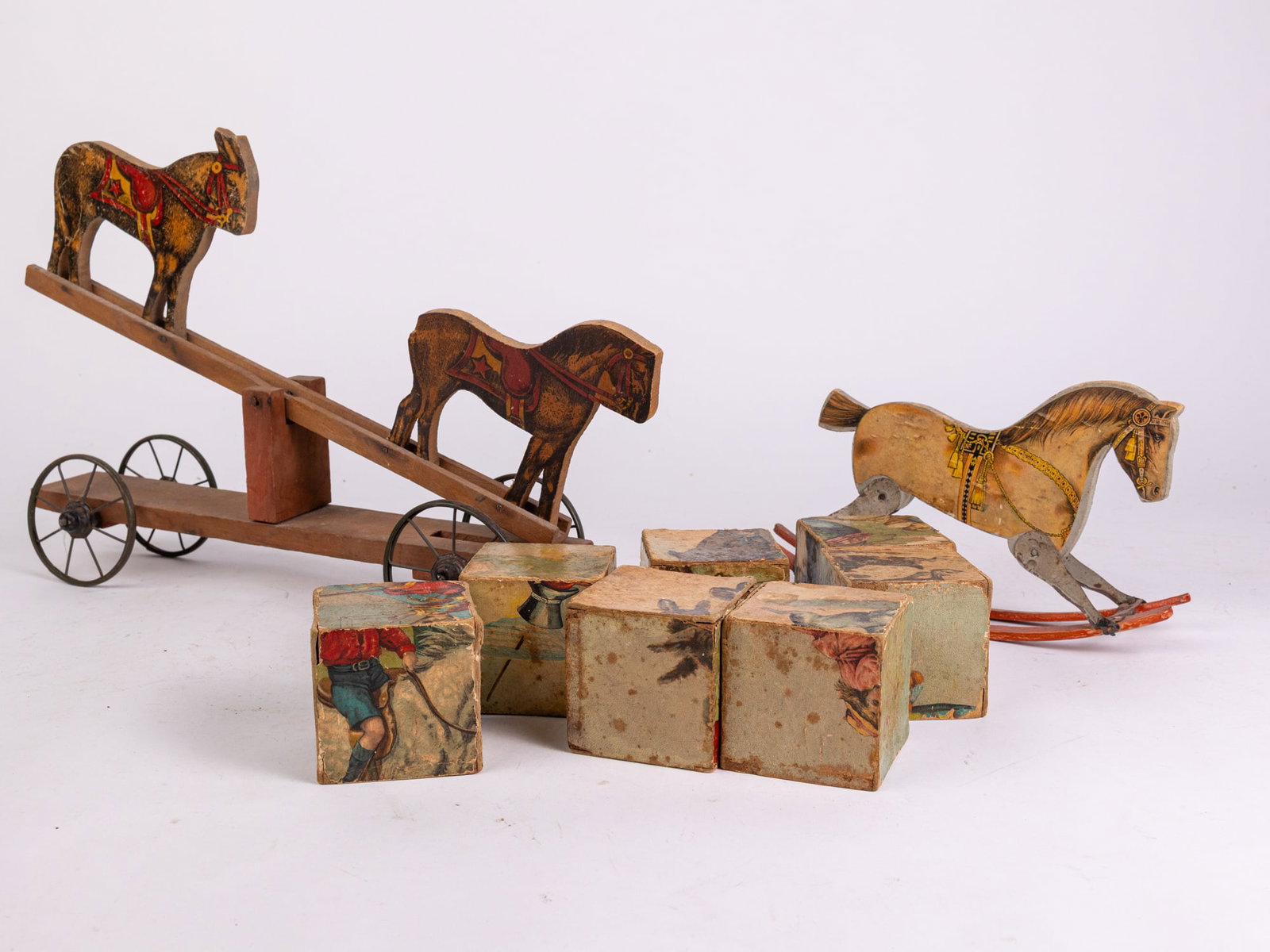 Assorted Antique Litho on Wood Toys: Assorted Antique Litho on Wood Toys: Gibbs Mfg. Co lithographed paper on wood rocking horse - antique lithographed paper on wood horse and donkey rocking toy - lithographed paper on wood 19th century