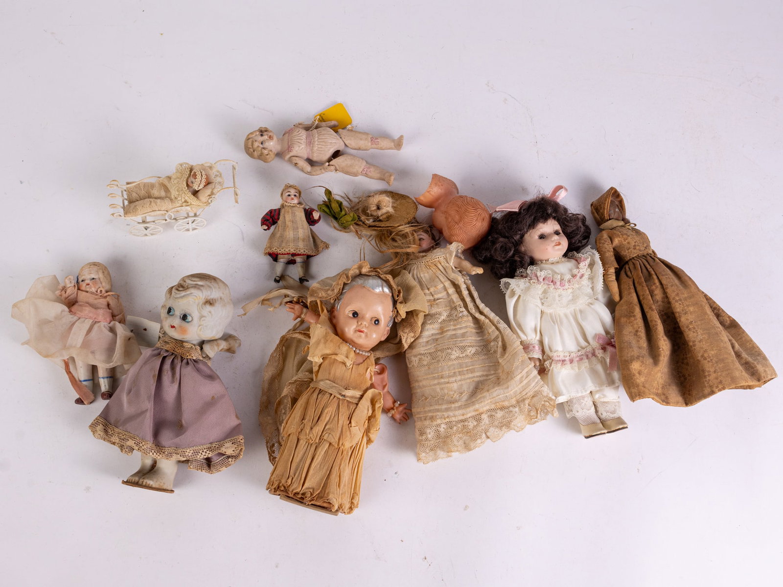 Assorted Antique Dolls: Assorted Antique Dolls, mostly bisque, assorted sizes Size 8" x 4" x 2" Literature Brooks Auction is not responsible for outbids. Questions? Call the office at (856) 694-2960 or email us directly at