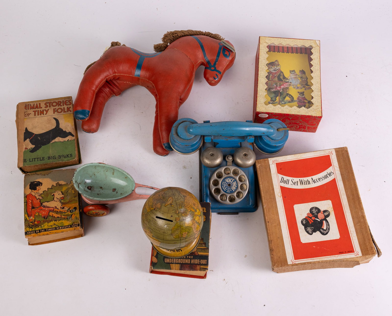 Lot of Vintage Toys: Lot of Vintage Toys: toy telephone - 1950's stuffed red horse toy - and more Size 11" x 9" x 4" Literature Brooks Auction is not responsible for outbids. Questions? Call the office at (856) 694-2960