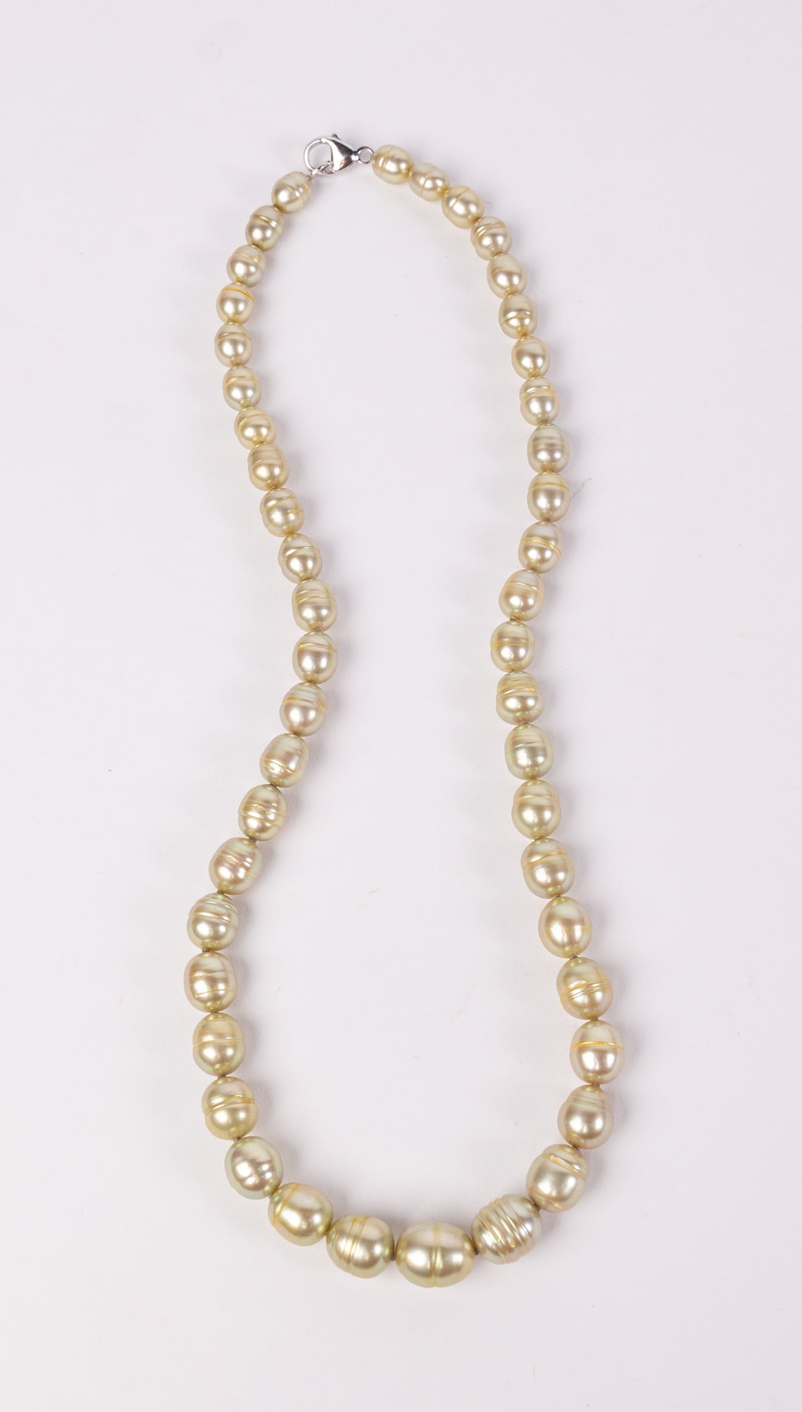 Graduated Chinese Freshwater Pearl Necklace: Graduated Chinese Freshwater Pearl Necklace: According to the Attached Estate Appraisal: One 925 silver lady's necklace with a lobster claw clasp. Condition is very good. Trademark is H. Identified wi