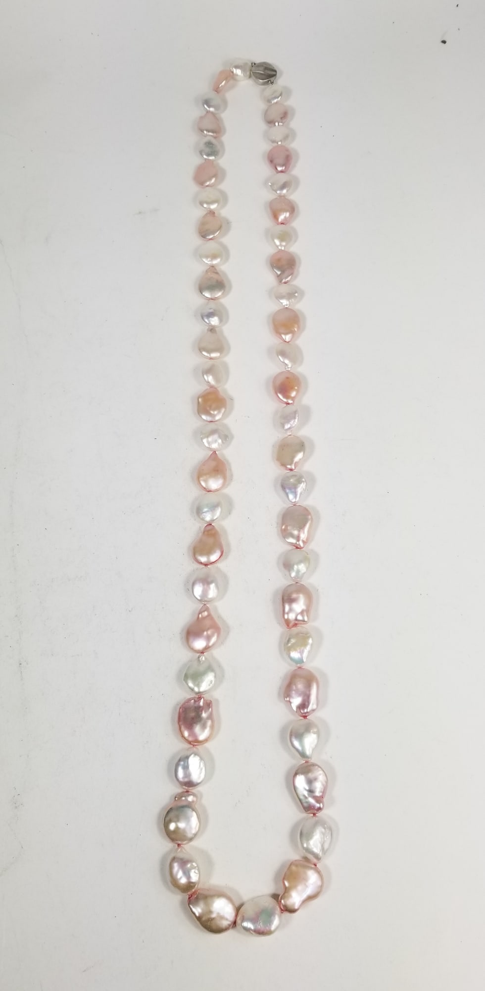 Pink and White Cultured Chinese Pearl Necklace: Pink and White Cultured Chinese Pearl Necklace: clasp marked 925, marked with H Literature Brooks Auction is not responsible for outbids. Questions? Call the office at (856) 694-2960 or email us direc