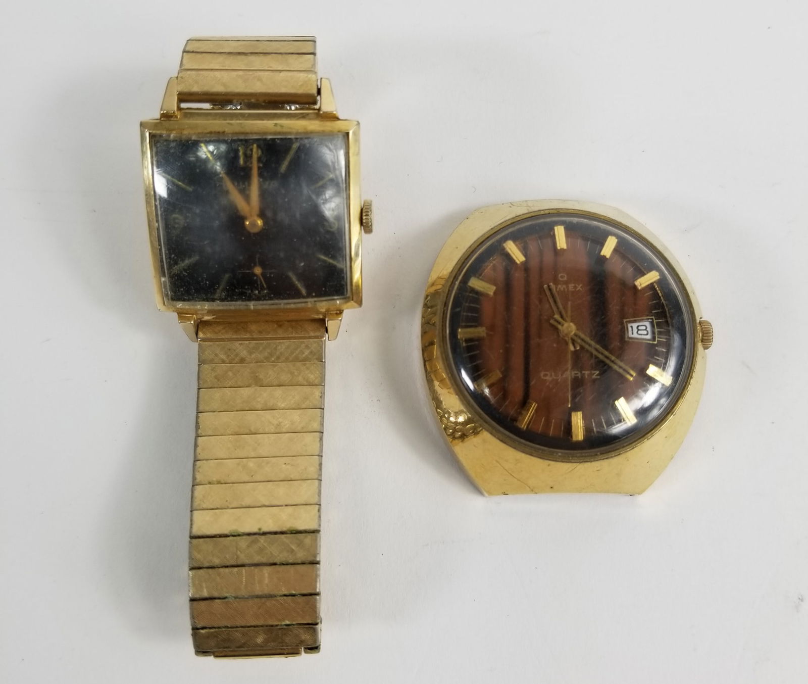 Two Vintage Wrist Watches: (2) Vintage Wrist Watches: Bulova, engraved, wristband is gold filled - Timex Literature Brooks Auction is not responsible for outbids. Questions? Call the office at (856) 694-2960 or email us direct