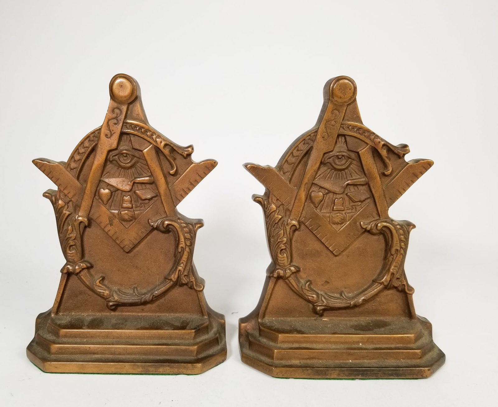 Pair of Freemasons Brass Bookends: Pair of Freemasons Brass Bookends Size 7" x 12" x 12" Literature Brooks Auction is not responsible for outbids. Questions? Call the office at (856) 694-2960 or email us directly at info@brooks.aucti