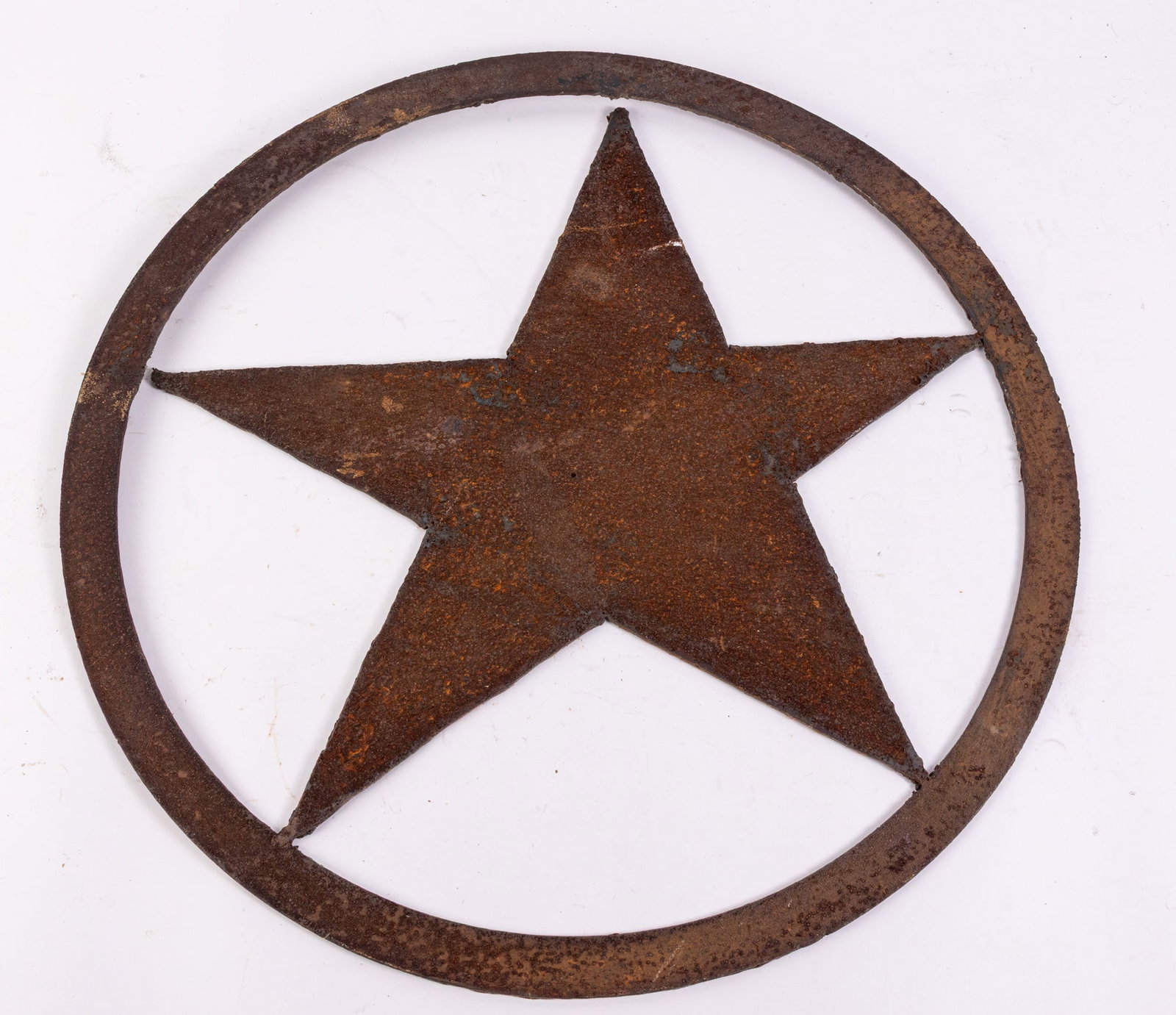 Early Hand Cut Iron Star Decoration: Early Hand Cut Iron Star Decoration, hand cut five pointed iron star with circular border. Two points of the star have become detached from border, but otherwise good condition. Literature Brooks Auct