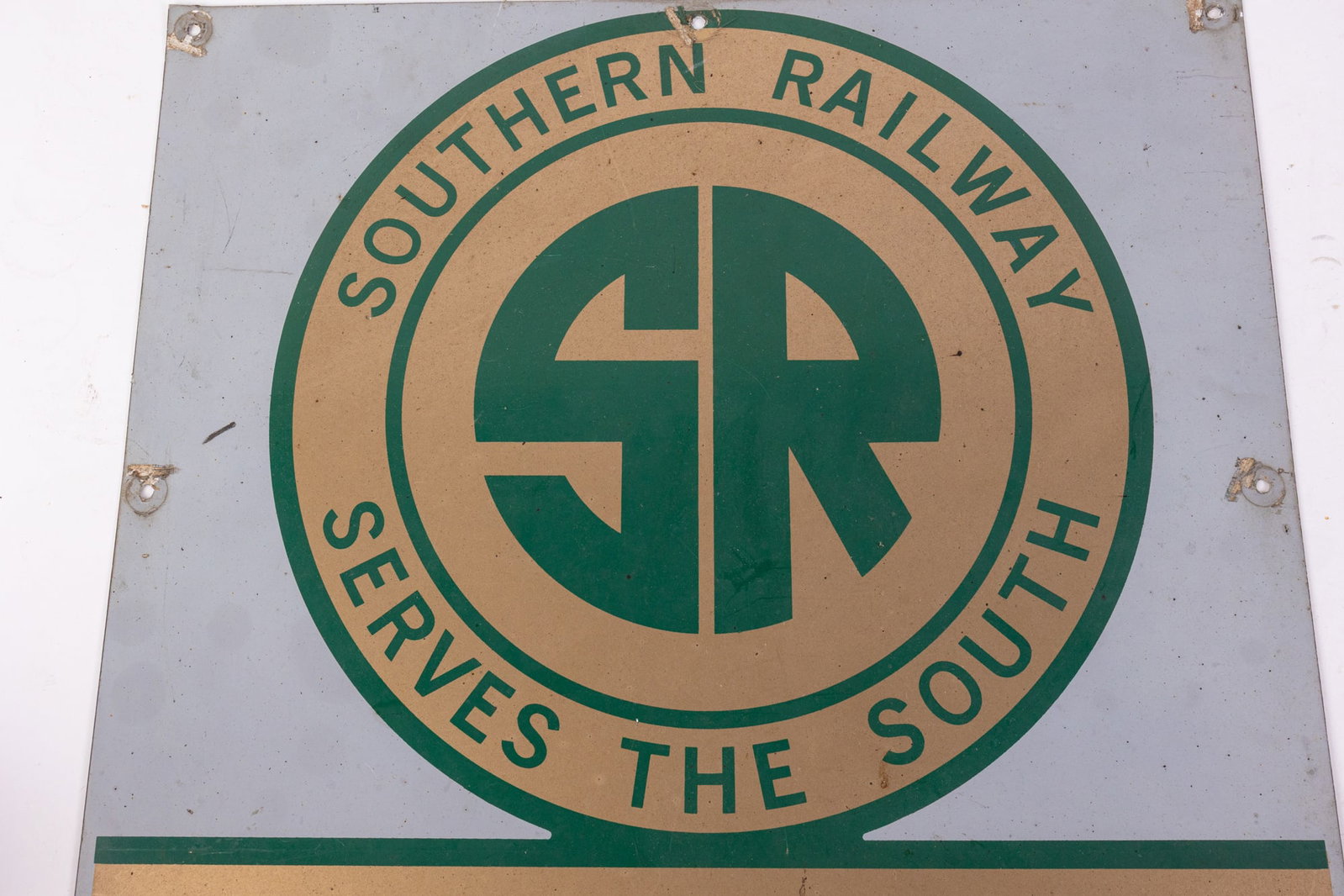 Southern Railway Vintage 1970's Aluminum Sign: Southern Railway Vintage 1970's Aluminum Sign, Aluminum sign with green text on gold toned background for the Southern Railway, a railway that operated between 1894-1982 in the Southeastern United Sta