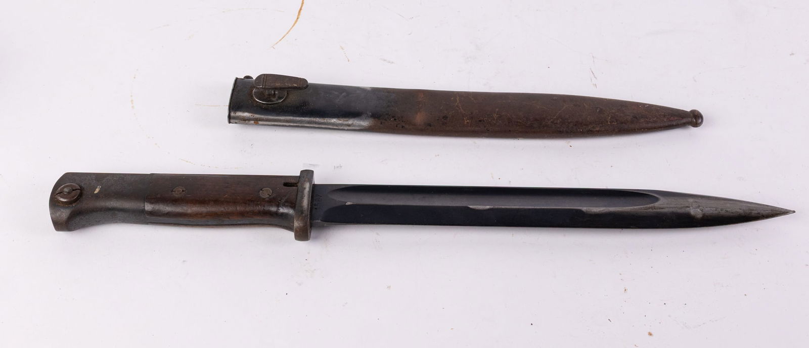 WWII Era German S/239.K 1587 Bayonet: WWII Era German S/239.K 1587 Bayonet Size 16" H Literature Brooks Auction is not responsible for outbids. Questions? Call the office at (856) 694-2960 or email us directly at info@brooks.auction.