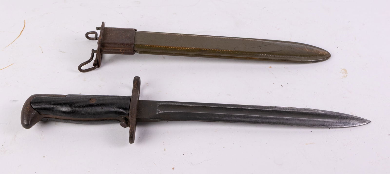 WWII PAL 1943 M1 GARAND Long Bayonet w/ Scabbard: WWII PAL 1943 M1 GARAND Long Bayonet w/ Scabbard Size 16" H Literature Brooks Auction is not responsible for outbids. Questions? Call the office at (856) 694-2960 or email us directly at info@brooks