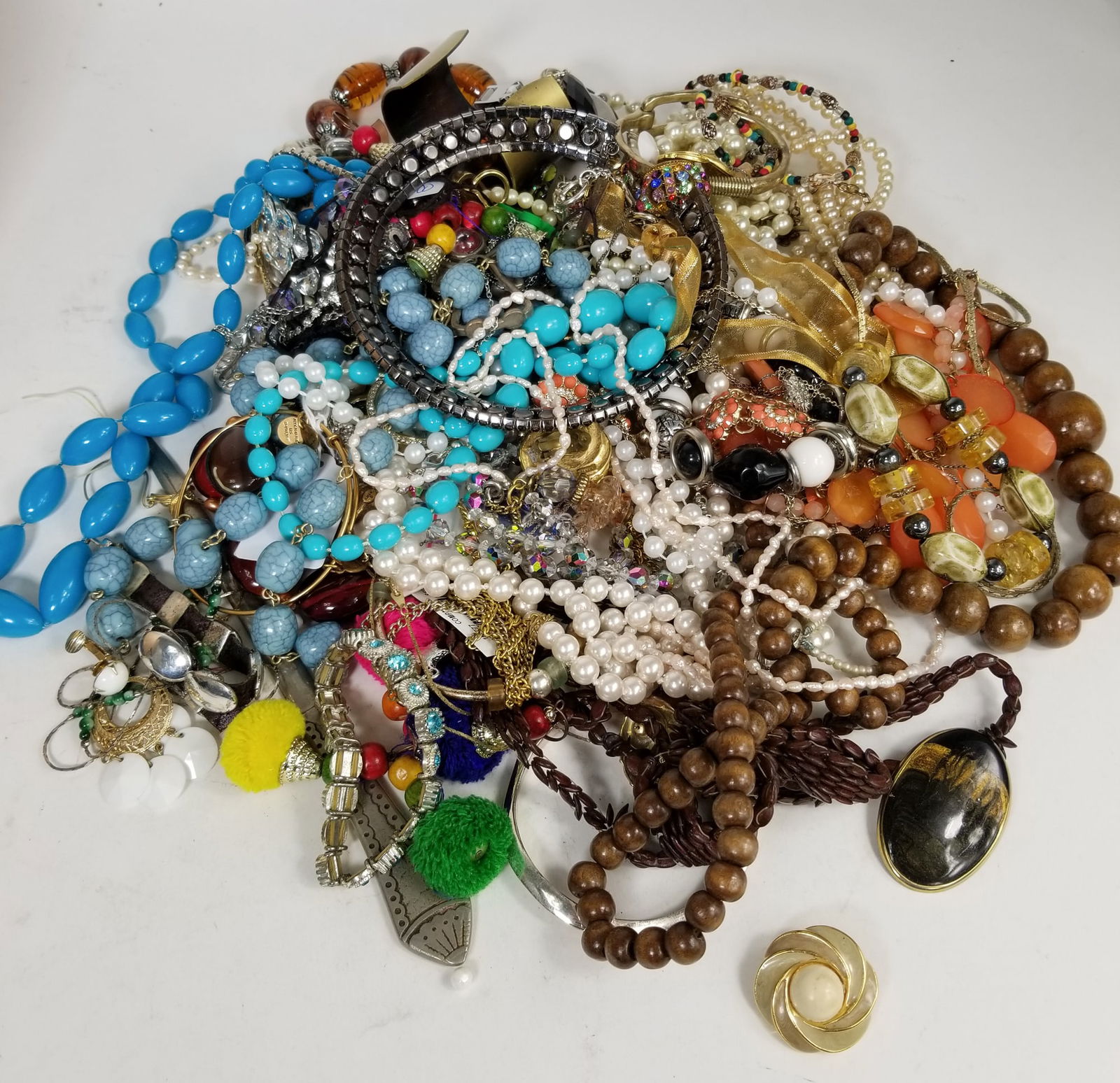 Costume Jewelry Featuring Trifari: Costume Jewelry Featuring Trifari: Trifari Earring - cuffs - pearl necklaces - earrings - and more Literature Brooks Auction is not responsible for outbids. Questions? Call the office at (856) 694-29