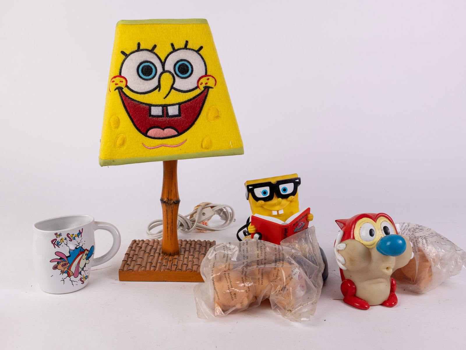 Nickelodeon Assortment ft. Spongebob & Ren and Stimpy: Nickelodeon Assortment ft. Spongebob & Ren and Stimpy Size 7" x 12" x 12" Literature Brooks Auction is not responsible for outbids. Questions? Call the office at (856) 694-2960 or email us directly