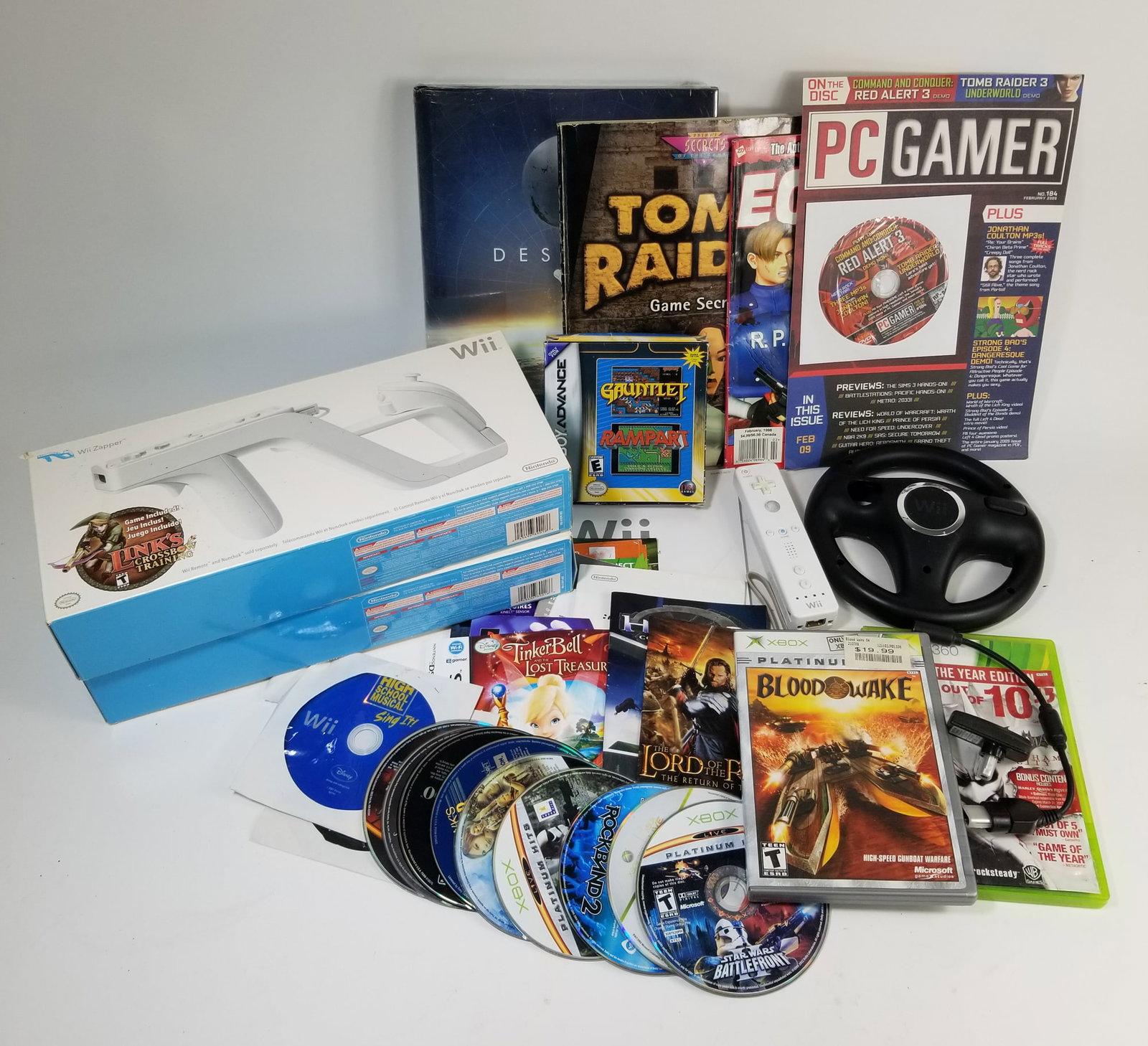 Video Game Assortment Lot ft. Sealed Destiny Guidebook: Video Game Assortment Lot ft. Sealed Destiny Guidebook Size 7" x 12" x 12" Literature Brooks Auction – Online Auction Terms & Conditions ————————&