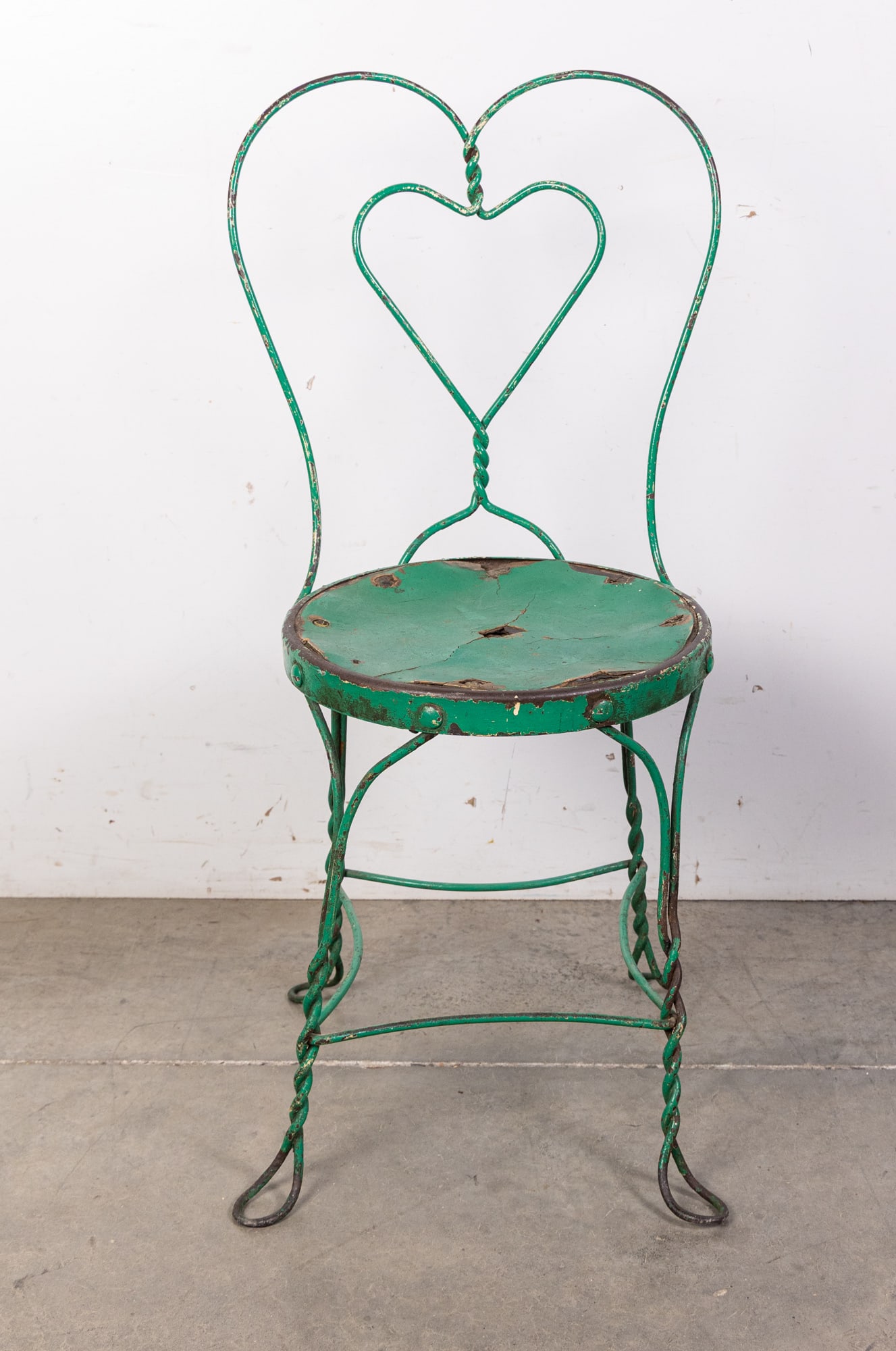 Wrought Iron Green Painted Ice Cream Parlour Chair: Wrought Iron Green Painted Ice Cream Parlour Chair Size 36" x 17" x 14" Literature Brooks Auction is not responsible for outbids. Questions? Call the office at (856) 694-2960 or email us directly at
